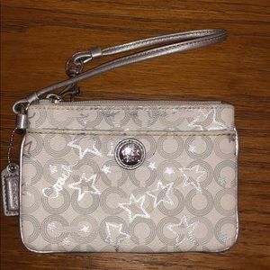 Coach wristlet white with silver stars